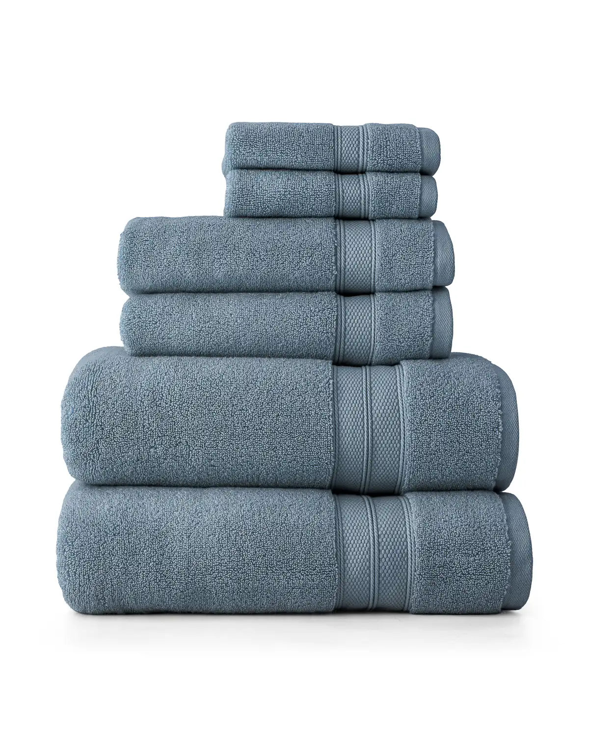 Set of 6 blue modal towels bundled and stacked on a white background, includes cotton washcloths, cotton hand towels, cotton bath towels