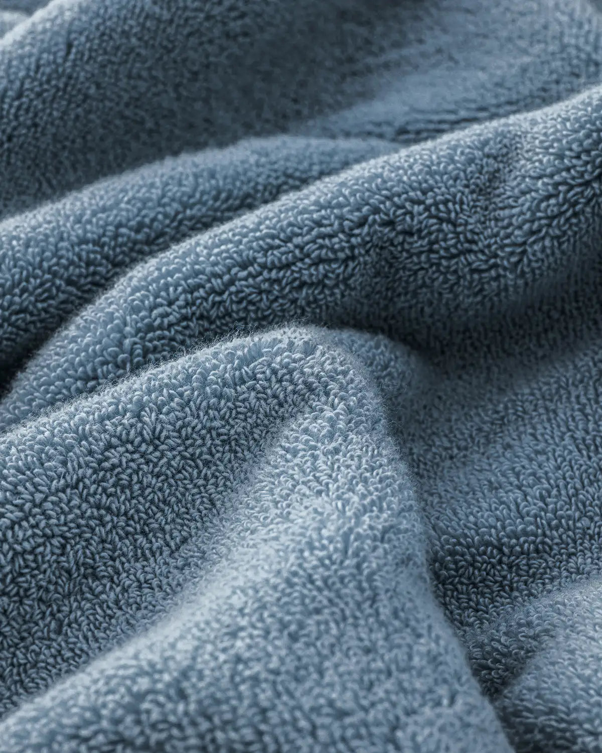 Close-up of textured blue modal towel