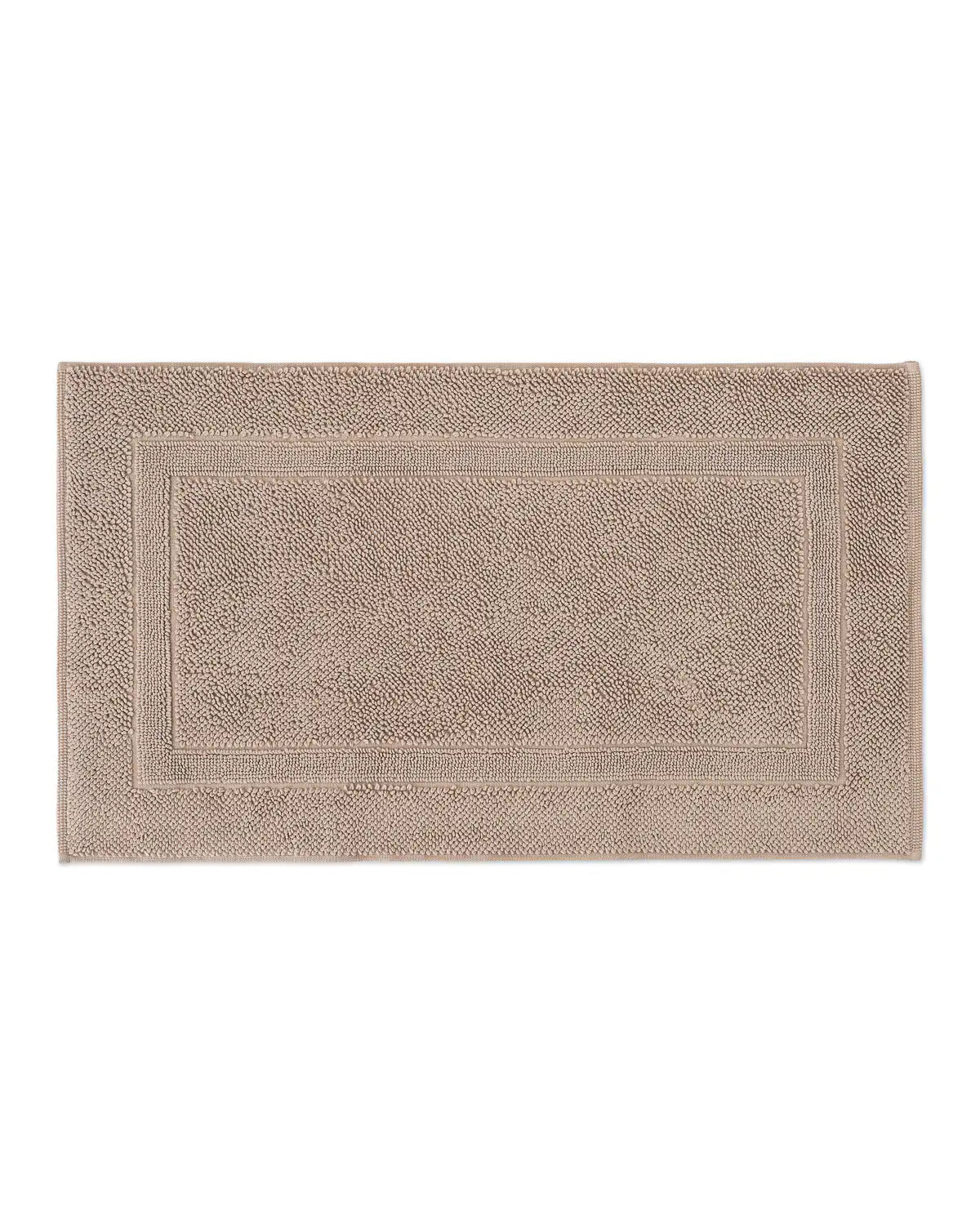 Sandshell High-Density Cotton Bath Rug with a textured border on a white background