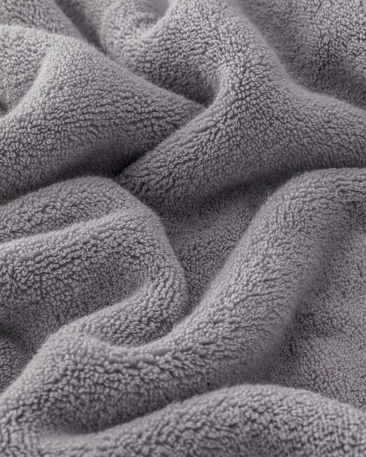 Close-up of a textured opal gray plush towel