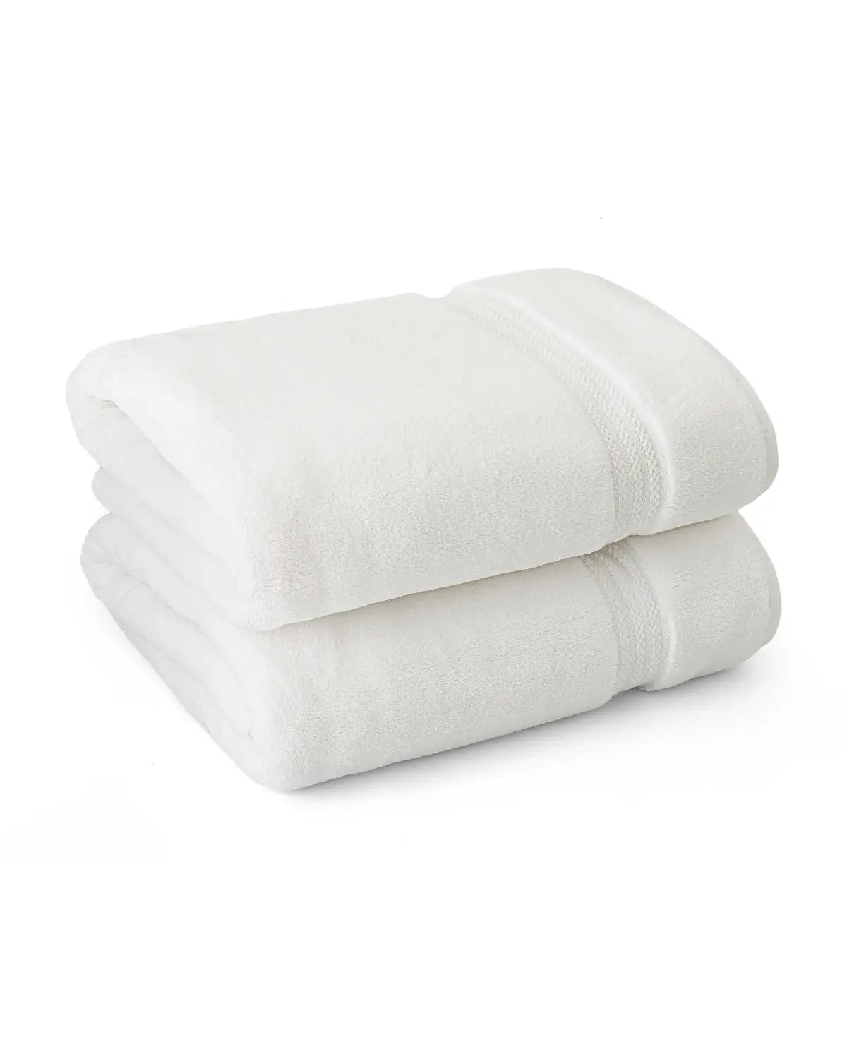 Two white ultrasoft cotton hand towels stacked on a white background