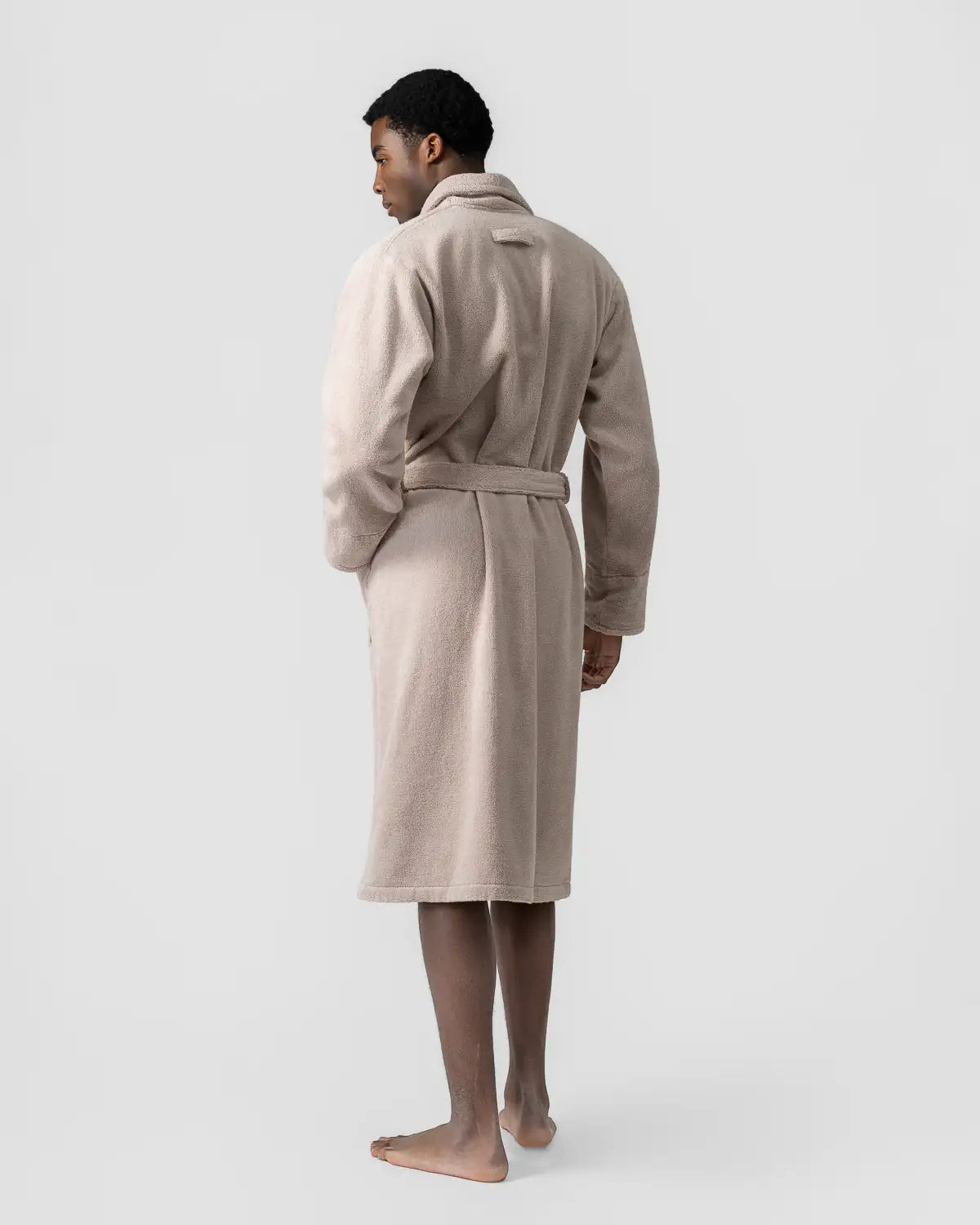 Person wearing a sandshell UltraSoft Premium Cotton High-Volume Bathrobe on a white background